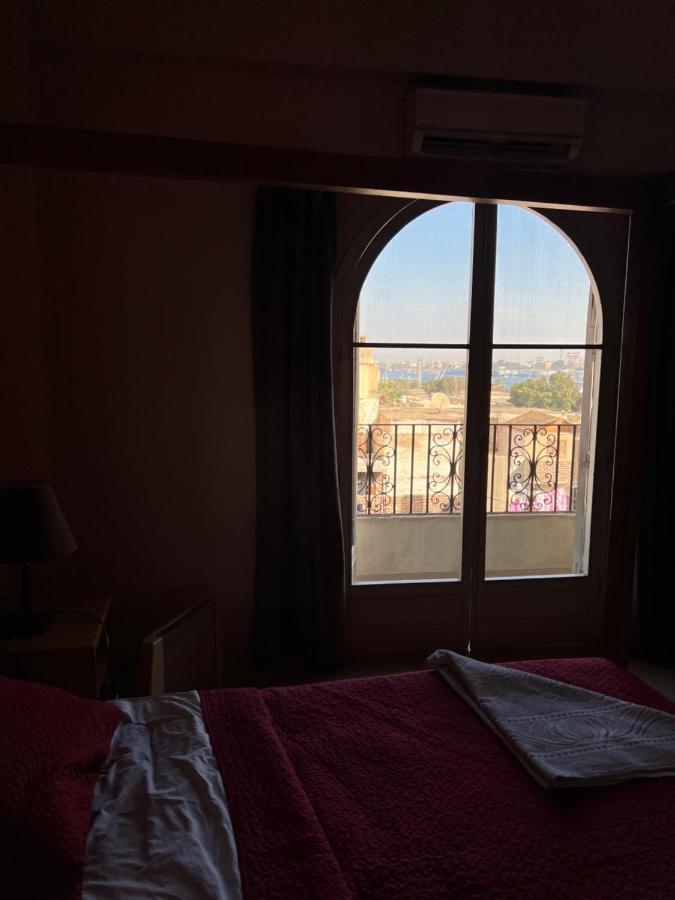 Hotel Harmony House Louxor Extérieur photo